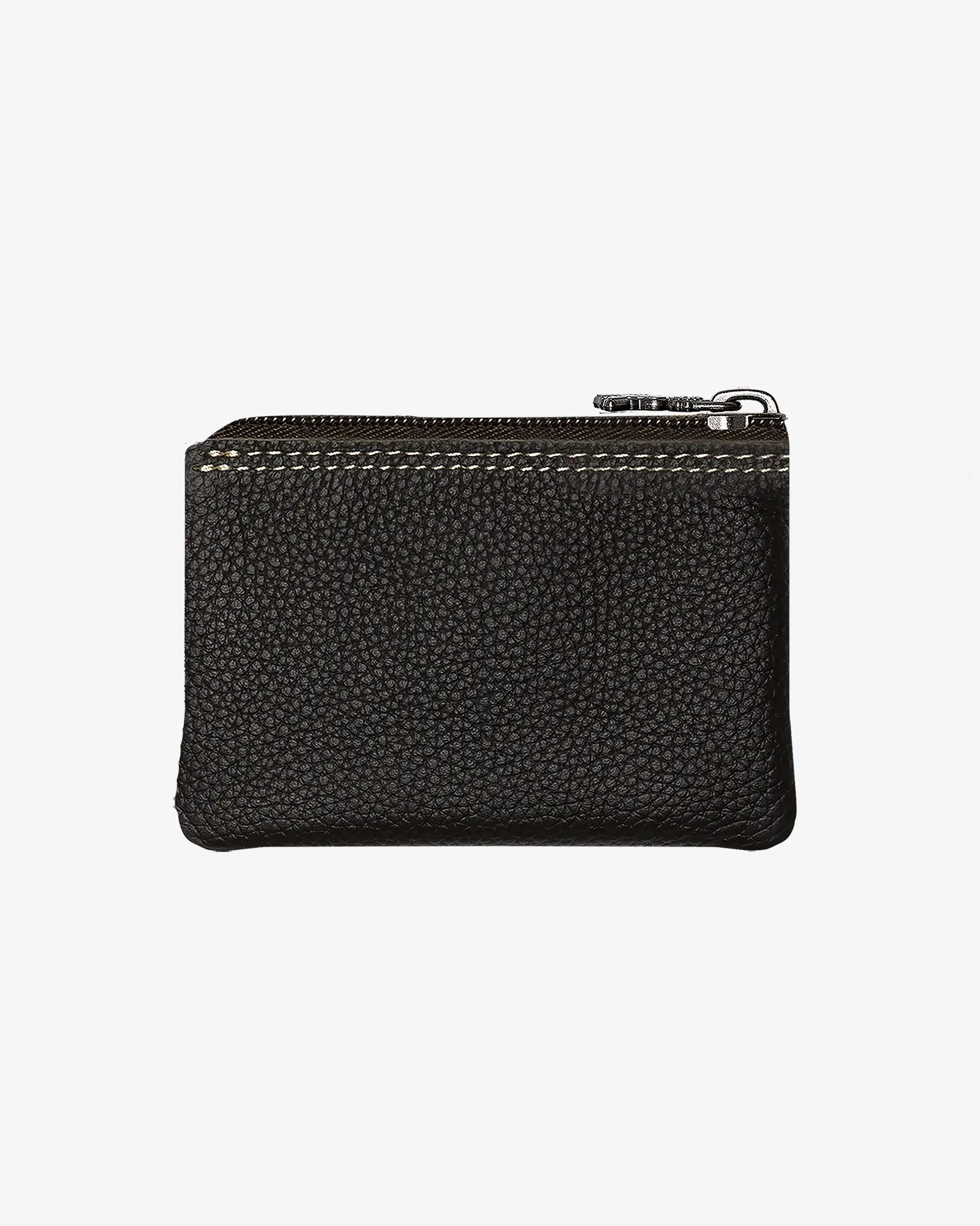 Crafted from 100% genuine leather for unmatched durability and a luxurious feel
Dimensions: 8cm height and 12cm width
Thoughtful design with precise stitching
Convenient zippered closure to secure your essentials safely
Exterior pocket enhances functionality for quick access
Embossed logo adds a subtle, distinguished detail
Ideal for daily use, balancing convenience and style effortlessly
Designed to withstand wear and tear, ensuring long-lasting value
Made in Portugal