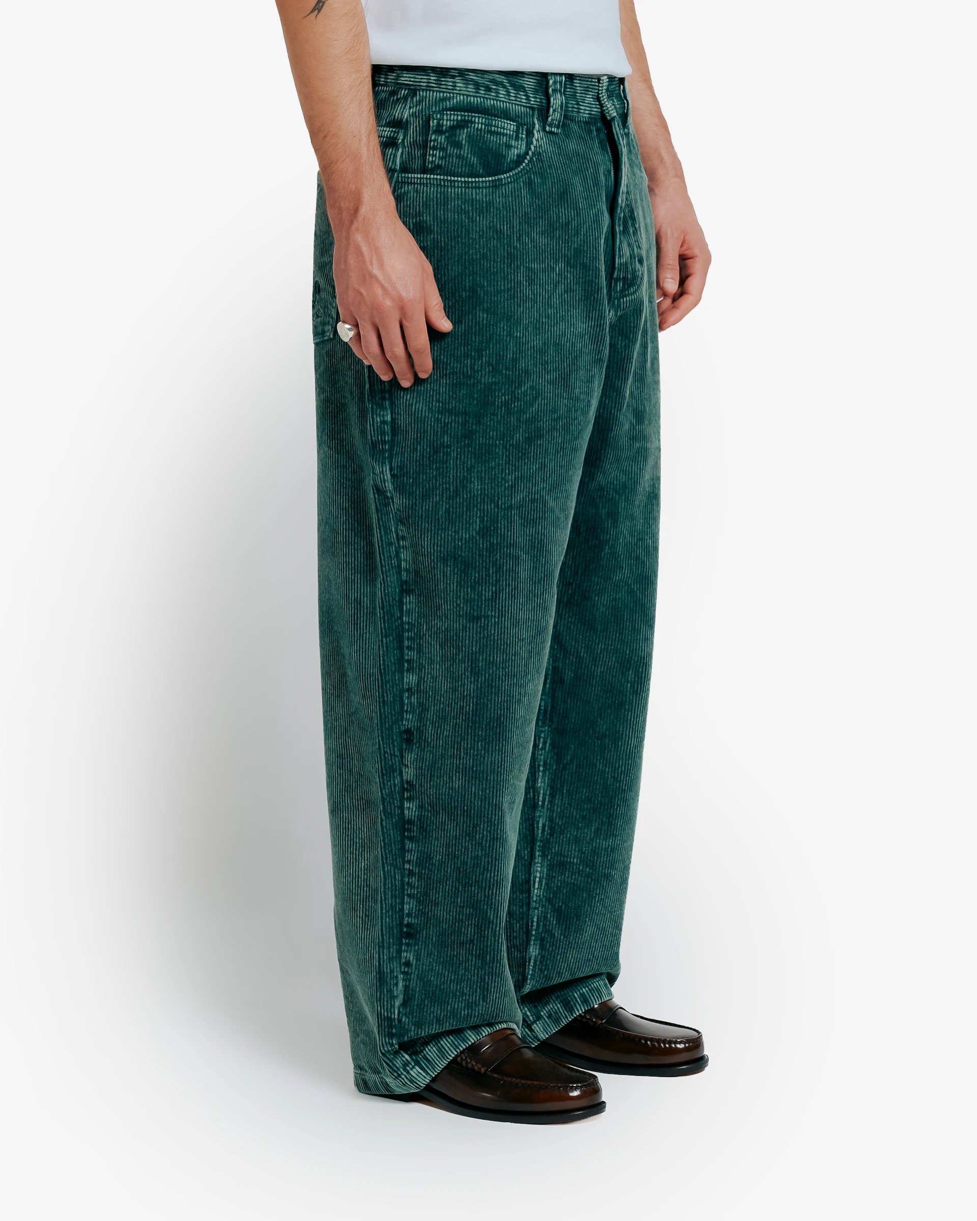 Bonga is our baggy fit. It is very loose from waist to ankle, designed for comfort and a bold, laid-back look.
Bold oversized look designed for maximum freedom of movement
100% cotton construction for lasting durability and comfort
Unisex fit engineered to suit all genders
Corduroy material with green washed colorway and an authentic wash treatment
Relaxed profile perfect for contemporary streetwear styling
Roomy cut allows for unrestricted movement throughout the day
Heavyweight fabric provides structure
