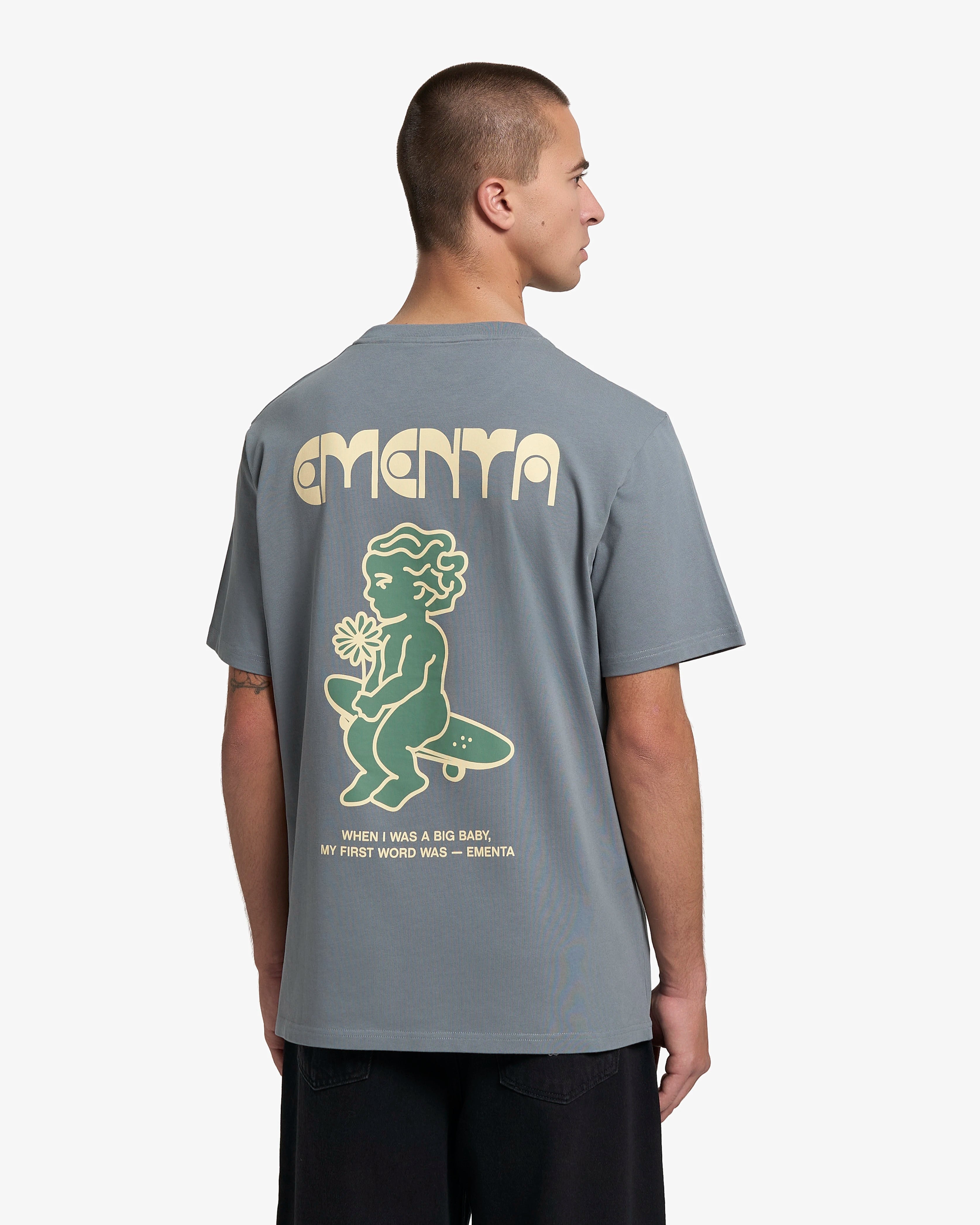 100% cotton, 240 g/m²
Soft feel with a structured shape
Grey color with off-white "First Word" print
Pre-shrunk to hold its shape after washing
Reinforced collar and double-stitched hems for durability
Unisex fit
Made in Portugal