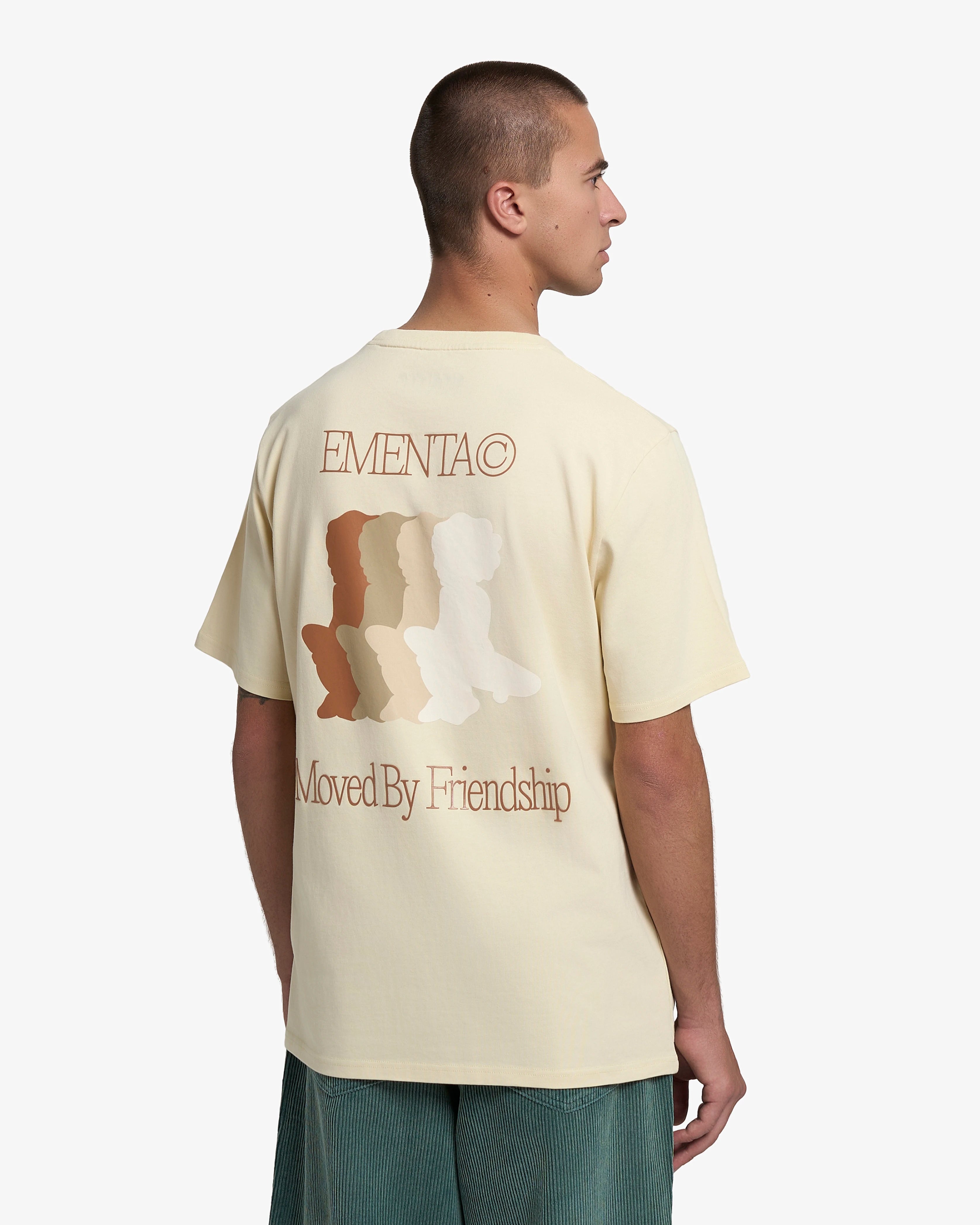 100% Cotton (220gsm)
Heavyweight cotton fabric with soft hand-feel
Boxy, relaxed fit with dropped shoulders
Ribbed crewneck collar
Screen-printed graphic on front and back
Artwork celebrates friendship and unity
"EMENTA© Moved By Friendship" motto on front and back
Double-stitched hems for durability
Made in Portugal