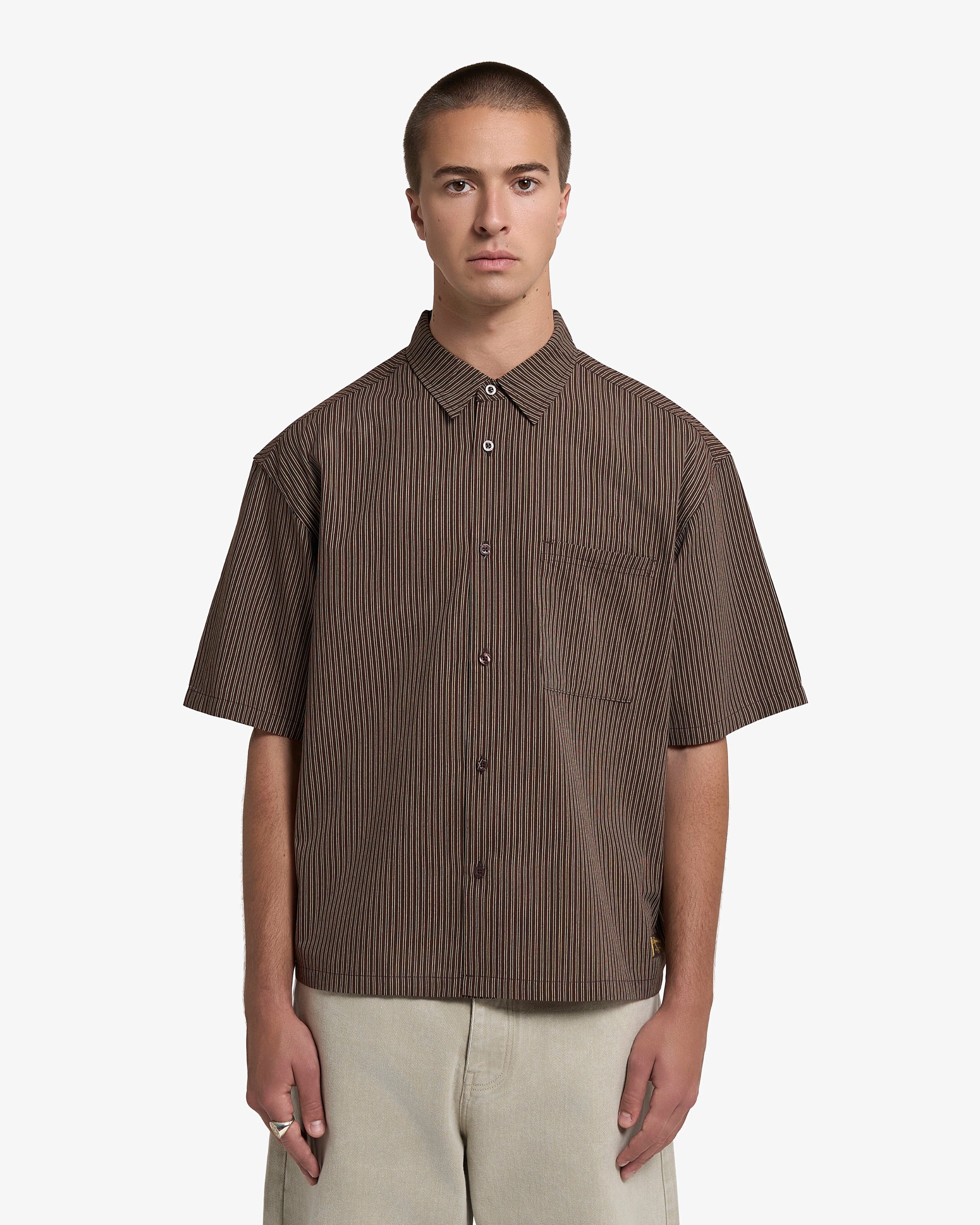 Crafted from soft brown 100% cotton fabric with a smooth finish for everyday comfort
Features a "Moved by Friendship" tag embroidered
Detailed with tonal stitching and minimalist design elements for a clean look
Styled with a regular fit that works well for casual and smart-casual occasions
Brown colorway offers easy coordination with various wardrobe pieces
Designed as a versatile layering piece suitable for year-round wear