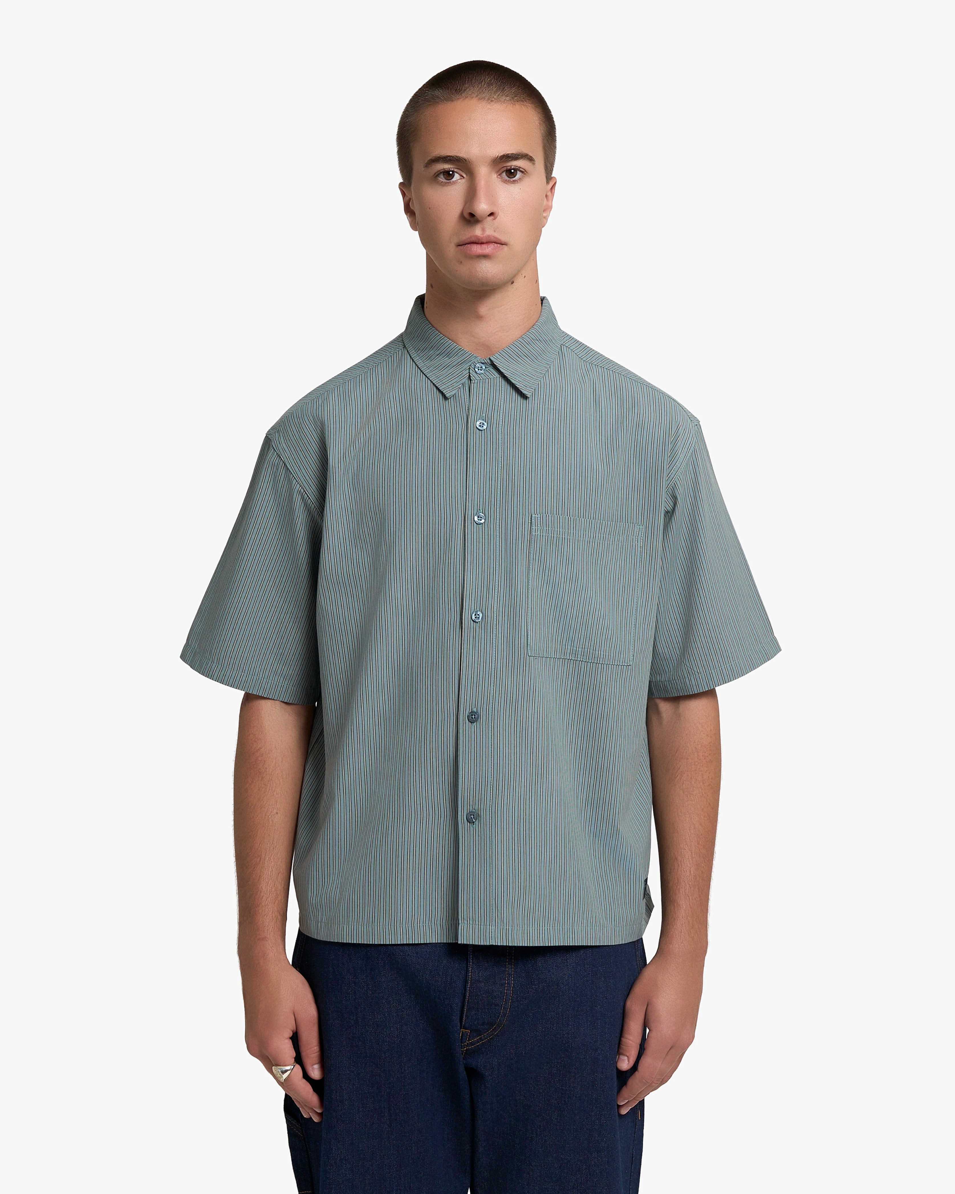 Crafted from soft blue 100% cotton fabric with a smooth finish for everyday comfort
Features a "Moved by Friendship" tag embroidered
Detailed with tonal stitching and minimalist design elements for a clean look
Styled with a regular fit that works well for casual and smart-casual occasions
Blue colorway offers easy coordination with various wardrobe pieces
Designed as a versatile layering piece suitable for year-round wear