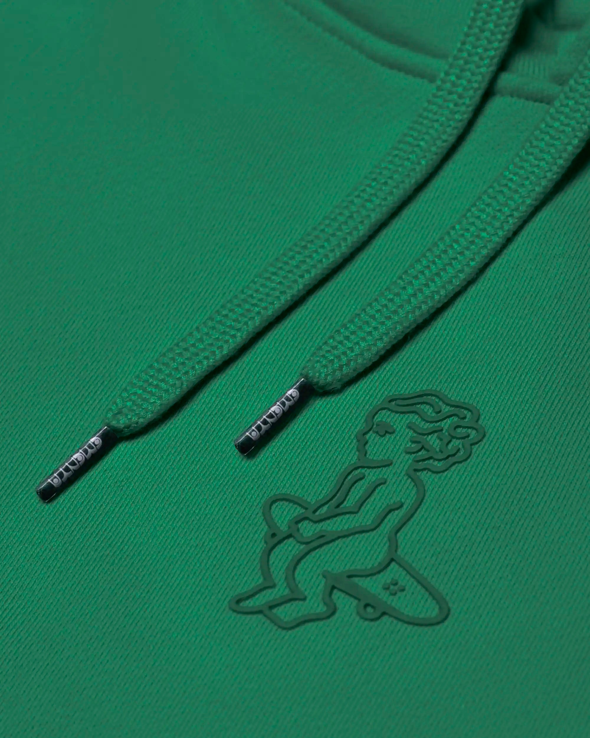 100% cotton (480 gsm) with brushed fleece interior
Evergreen&nbsp; color with an embossed textured Ikon stamp on the back
Subtle signature embroidery on the right wrist
Ribbed cuffs and hem for secure, comfortable fit
Classic kangaroo pocket for easy storage
Zip-less design with a clean pullover silhouette
Made in Portugal&nbsp;
Unisex fit