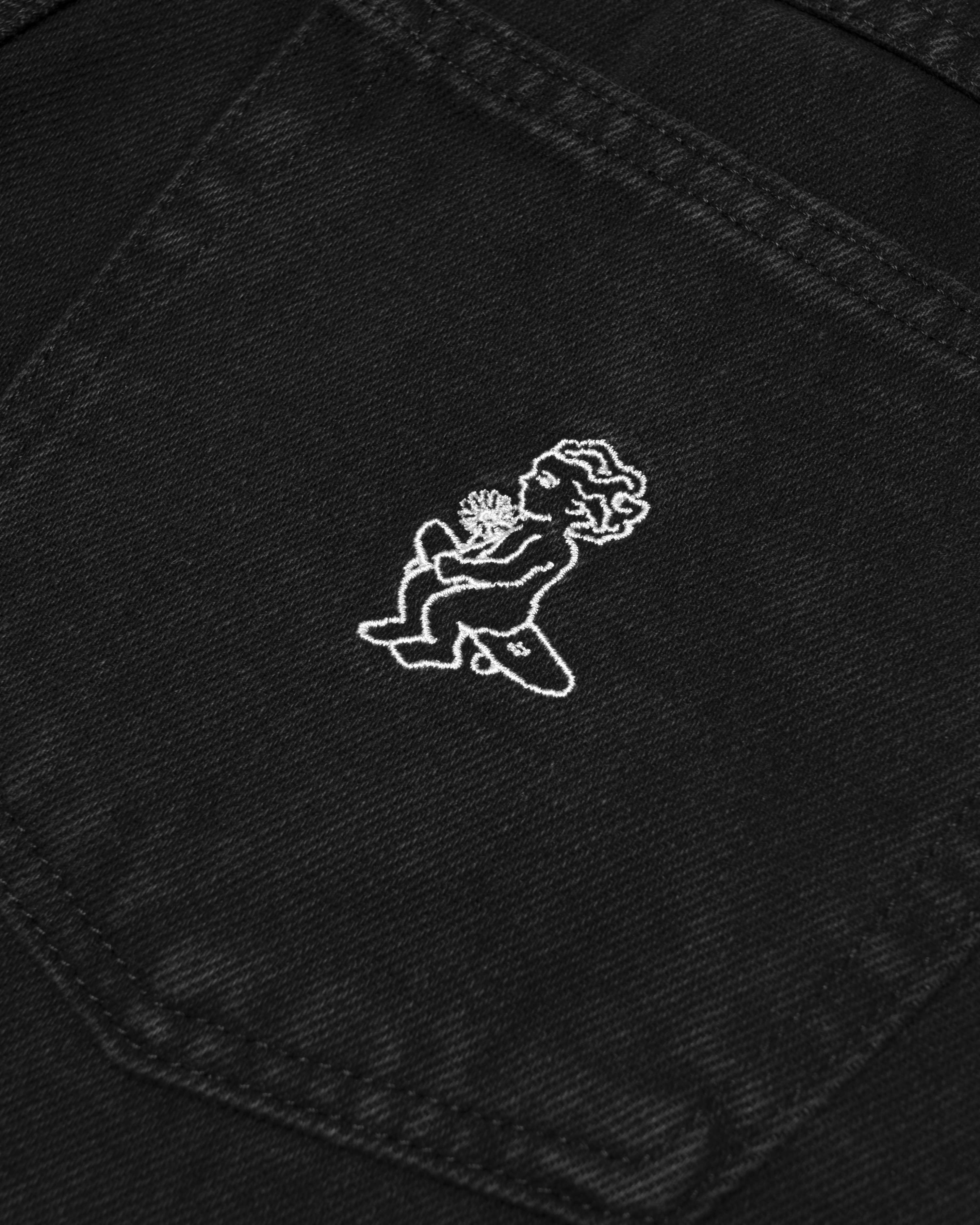 100% cotton black denim with a stone-washed finish for a soft, worn-in look
Oversized, baggy fit designed for women – high-rise waist and relaxed leg for all-day comfort
Slight taper toward the ankle for a balanced, modern silhouette
Classic 5-pocket construction with a functional coin pocket
Reinforced seams for added durability and long-lasting wear
Embroidered "ementa" signature logo on the front pocket
Ikon Flower logo embroidered on the back pocket
Branded button closure with metal zip fly