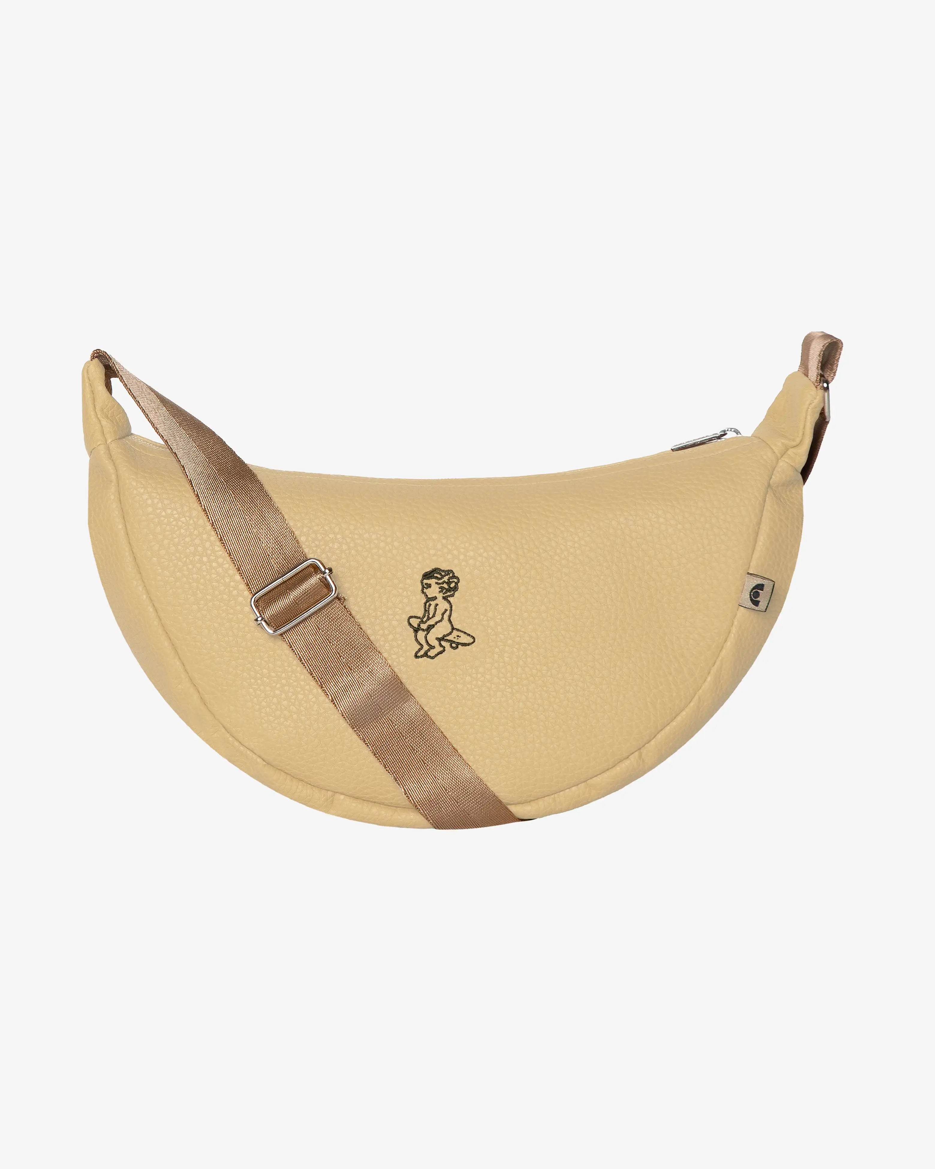 Off white synthetic leather material for a sleek and durable finish
Adjustable nylon strap for different carrying options
Zipped back pocket for secure storage
Spacious interior with an additional interior pocket
Dimensions: 29cm (length) x 16cm (height) x 10cm (width)
Ikon embroidery detail
Handmade in Portugal