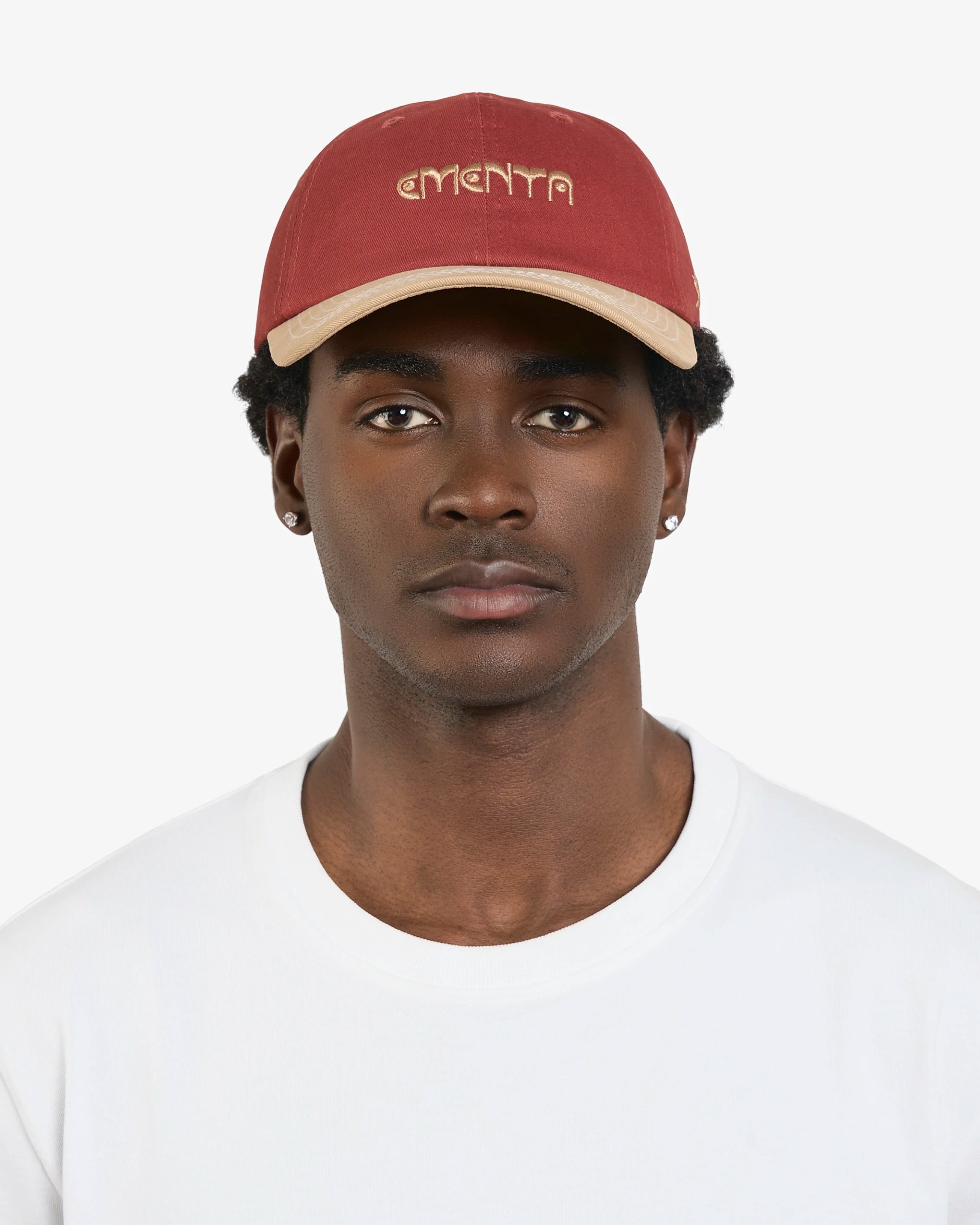 Classic six-panel cap inspired by Lisbon’s cultural heritage
Crafted from durable 100% cotton twill for long-lasting wear
Rust coloured crown with a camel curved brim featuring visible white stitching
Embroidered Ementa Dots logo on the front panel
Lisa design on the side, paying tribute to Lisbon’s iconic tiles and swallows
Adjustable back strap for a comfortable and customizable fit
One size fits all