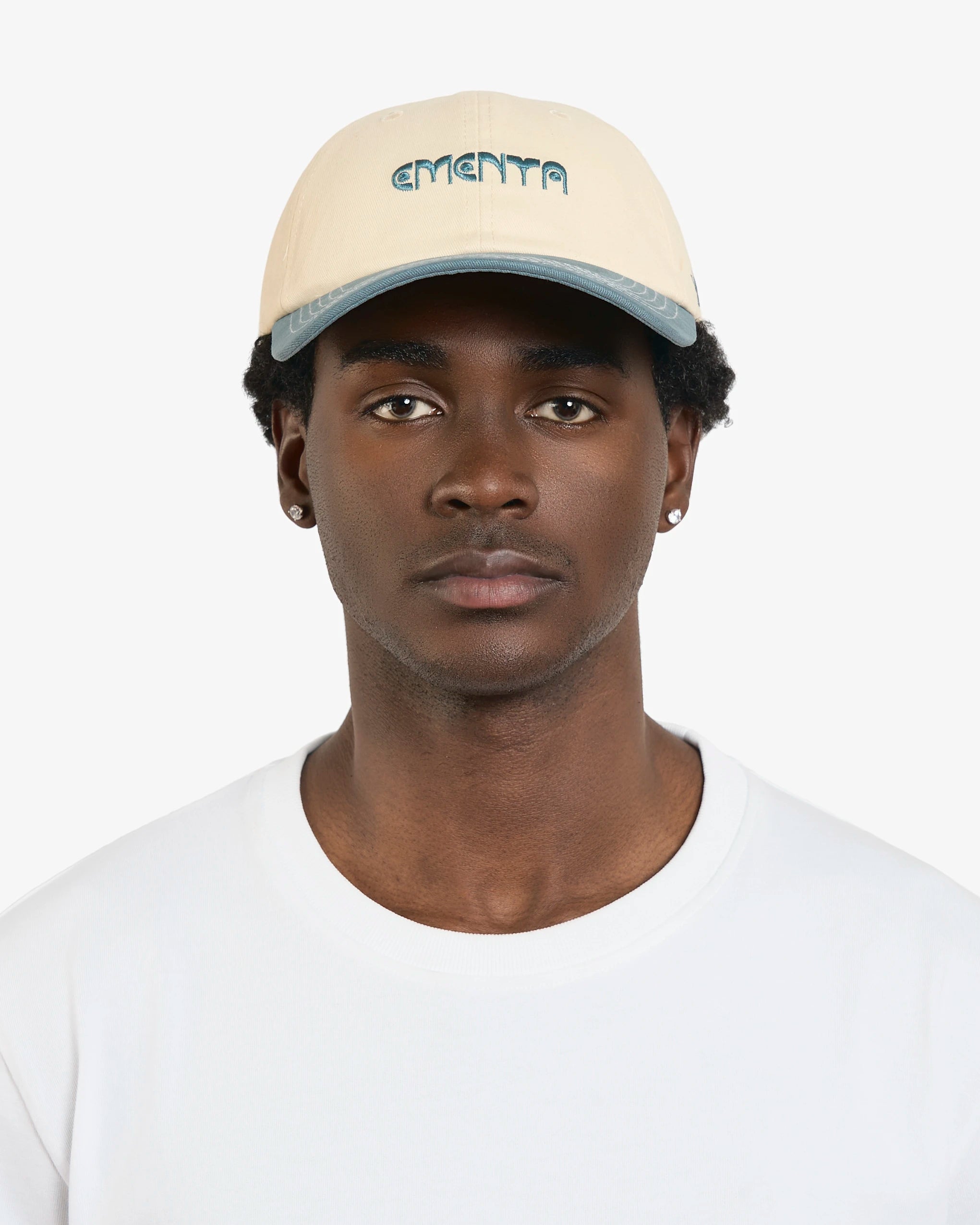 Classic six-panel cap inspired by Lisbon’s cultural heritage
Crafted from durable 100% cotton twill for long-lasting wear
Off-white crown with a light teal curved brim featuring visible white stitching
Embroidered Ementa Dots logo on the front panel
Lisa design on the side, paying tribute to Lisbon’s iconic tiles and swallows
Adjustable back strap for a comfortable and customizable fit
One size fits all