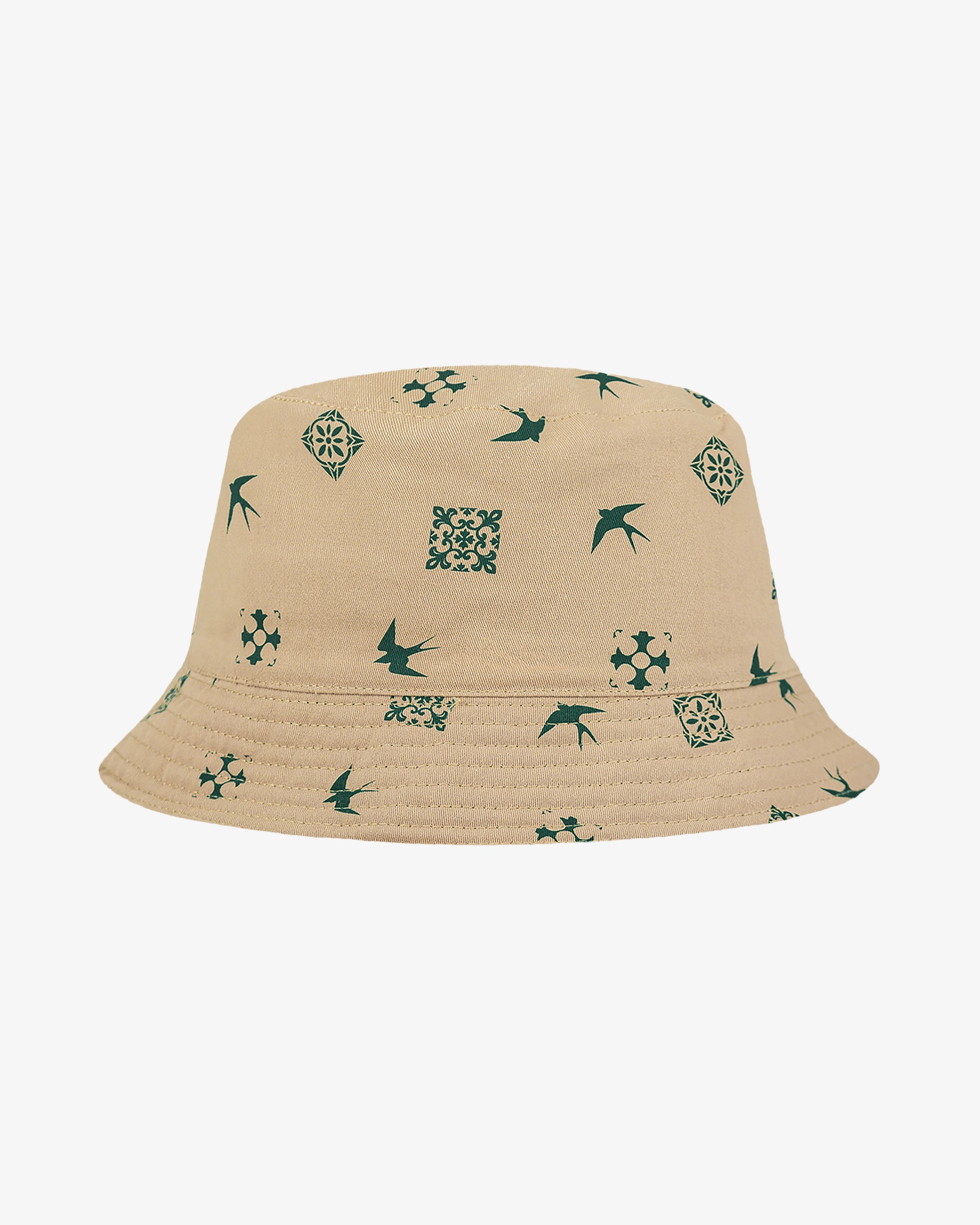 Inspired by Lisbon’s rich culture, featuring traditional tiles and swallows
Reversible design for versatile styling
One side: Forest green with embroidered Ementa Dots logo and swallow detail
Reverse side: Off-white with a forest green pattern of Lisbon’s iconic tiles and swallows
Made from durable 100% cotton twill for breathability and comfort
Classic bucket hat silhouette
One size fits all