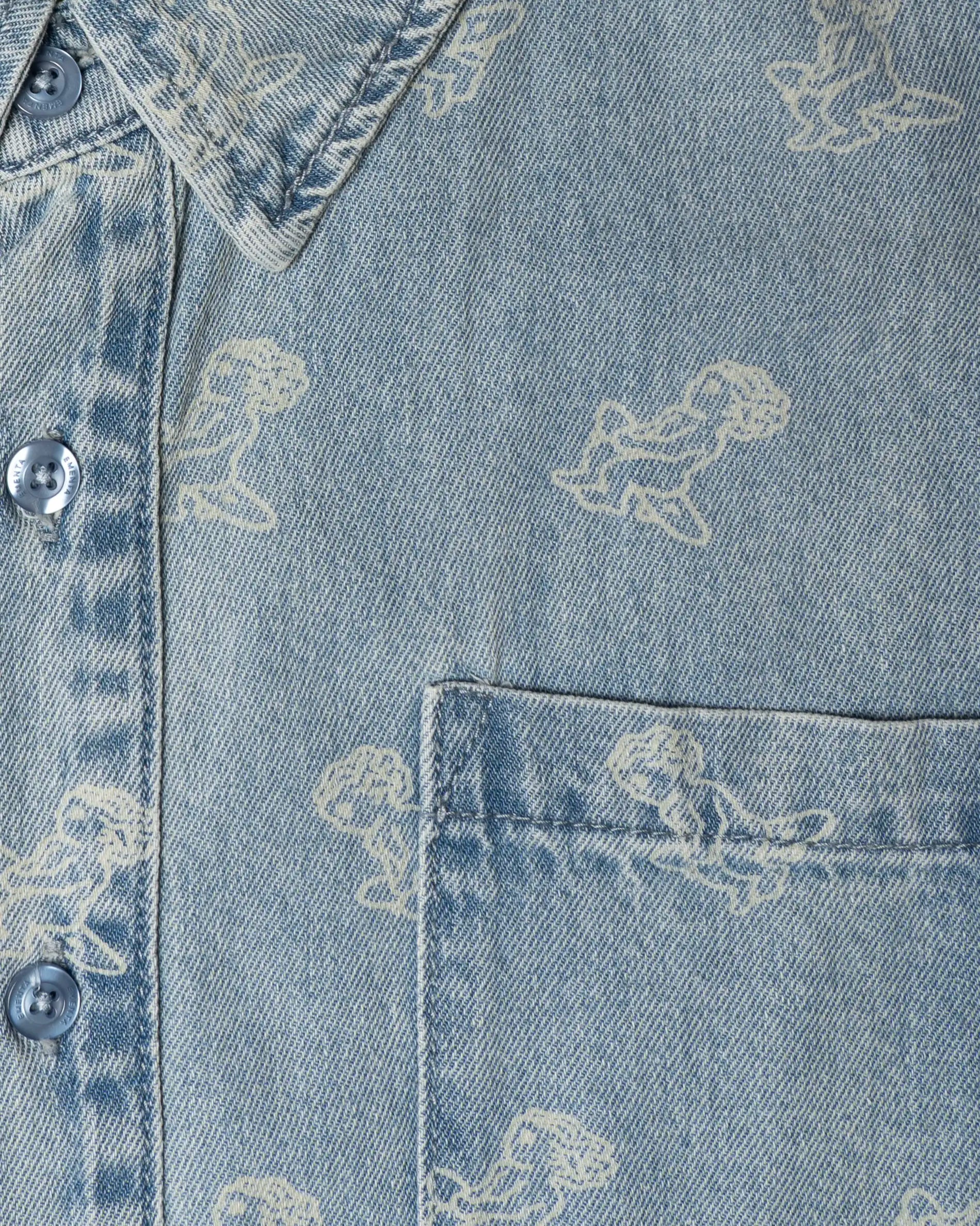 Light blue denim with all-over Ikon logo
Made from 100% cotton for a soft, breathable feel
Short-sleeved construction with a single chest pocket
Button front closure with tonal stitching
Slightly dropped shoulders for a relaxed silhouette
Unisex design&nbsp;
Cold wash only