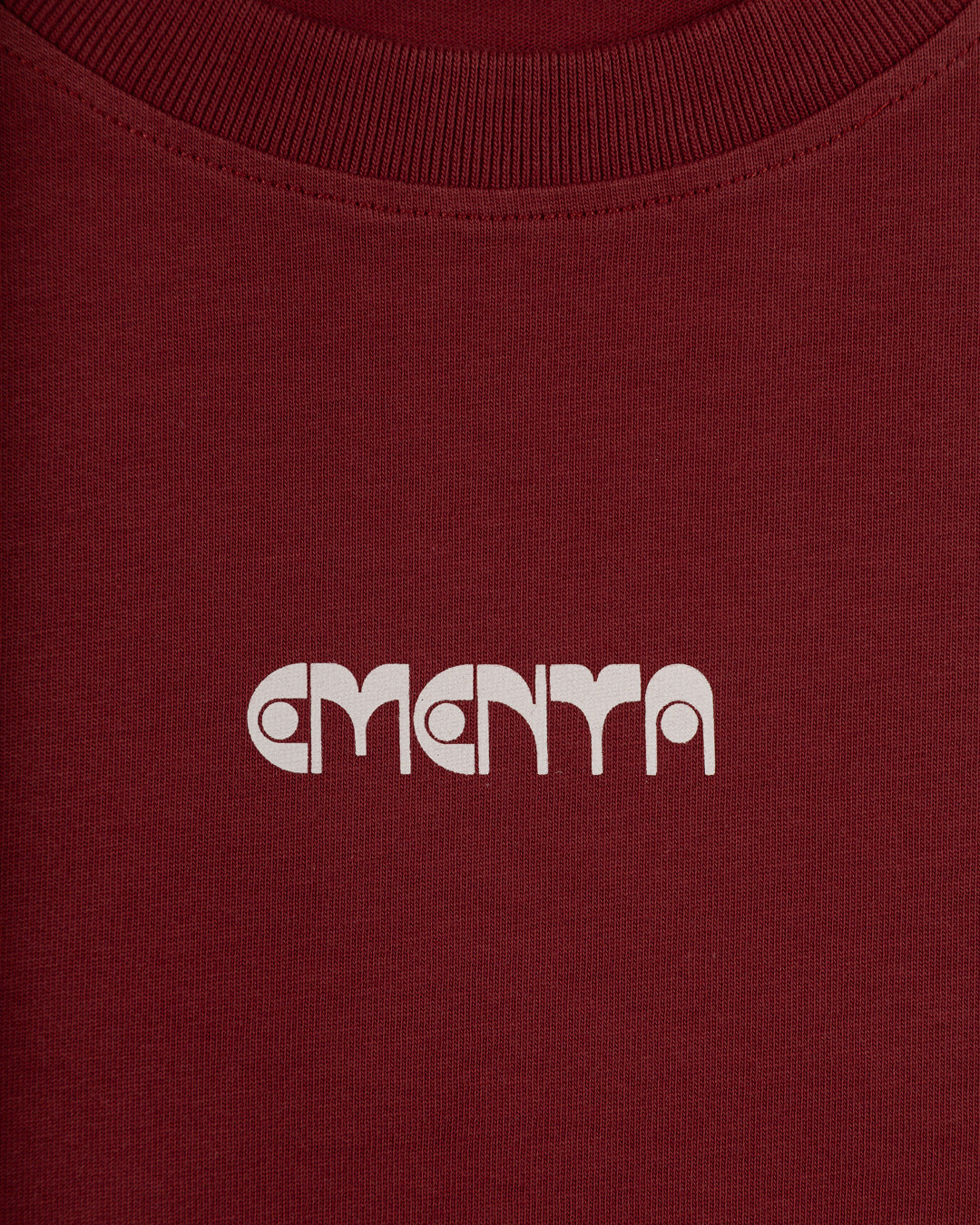 Artist Collaboration T-Shirt.

The Loyalty T-shirt in burgundy, features the Ementa logo on the front and an artwork from our latest artist collaboration on the back. It offers a regular fit, blending comfort with a creative design.