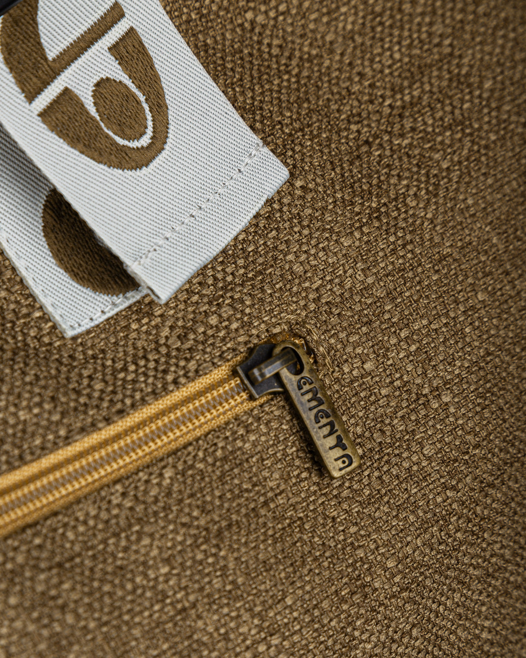 A practical companion for short trips or everyday use. Made from soft, breathable linen in a warm camel tone, this bag combines functionality with elegance. The 'dots' ementa logo is subtly placed on the front and straps, adding a unique touch. It features adjustable straps for a comfortable fit, a spacious 40L capacity, a small inner pocket for valuables, and an additional exterior pocket on the back for easy access to essentials.

Sized to meet airline cabin dimensions, it’s also a reliable choice for tra