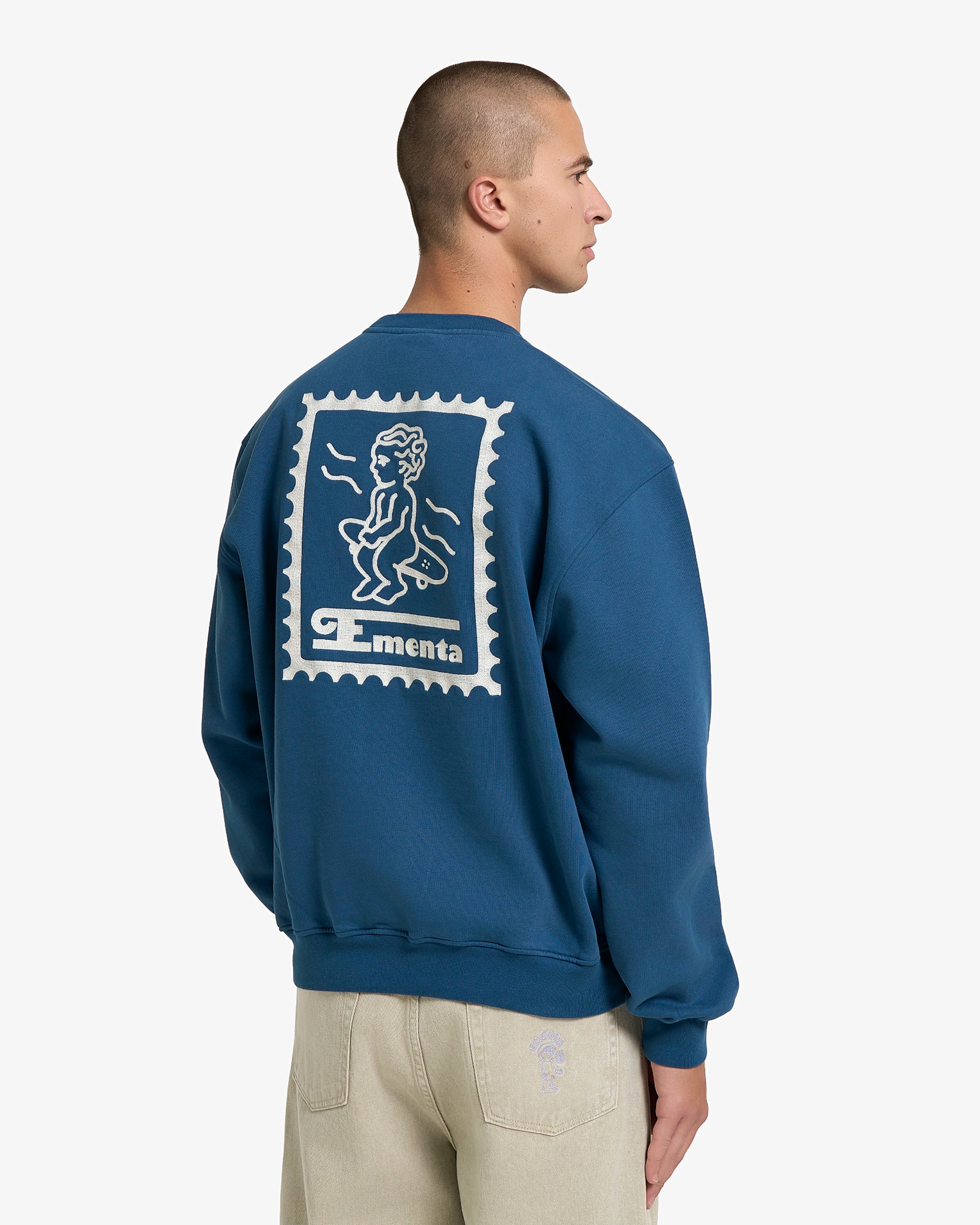 Heavy organic cotton fabric
Navy color with embroidered details in off-white
100% Cotton
Embroidered Ikon Stamp design on the back
Ikon logo embroidered on the front
Fleece interior for added comfort
Designed for durability and long-lasting wear

Natural texture and weight
Comfortable fit for everyday wear

Made in Portugal