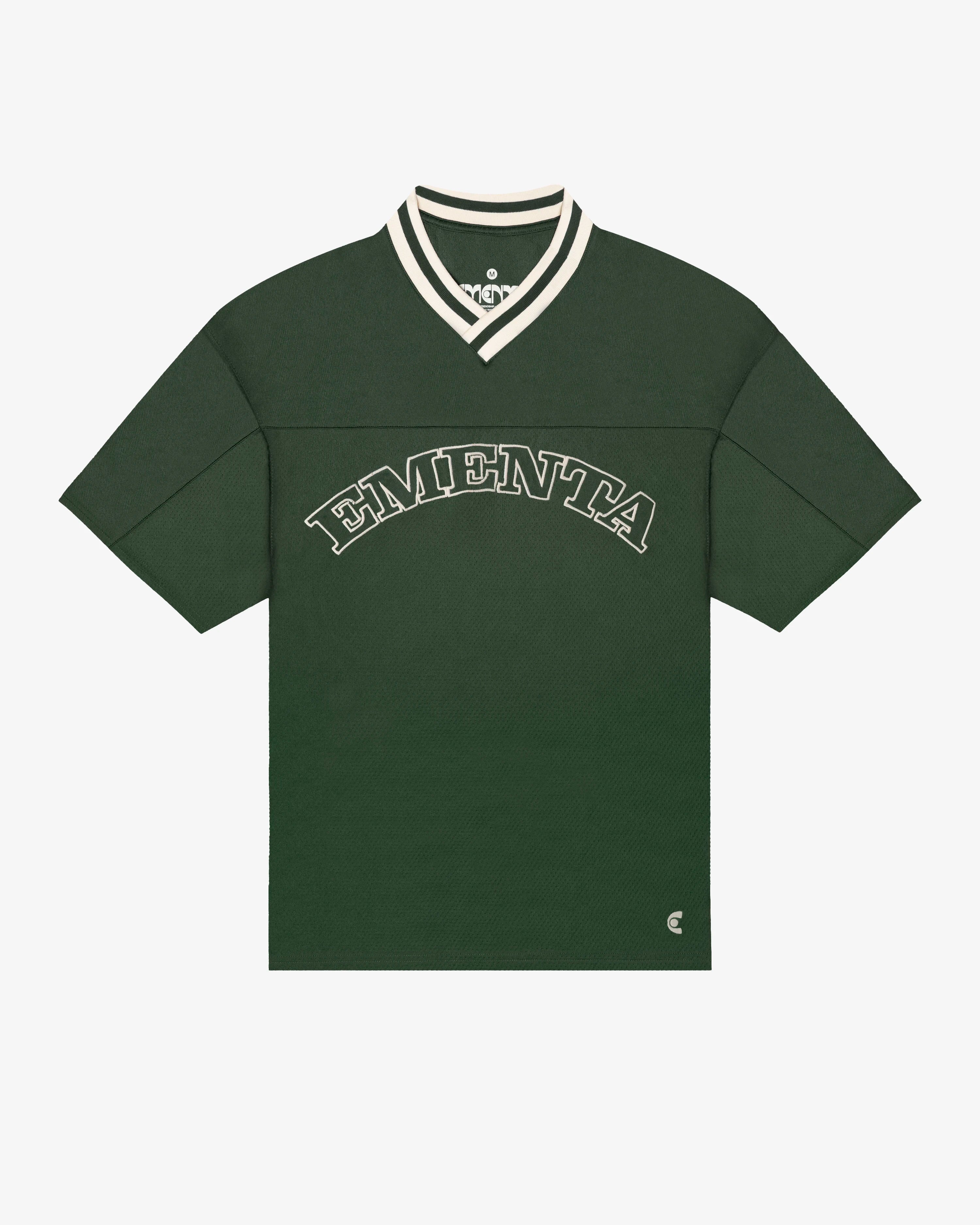 Breathable mesh fabric on the lower half, cotton-poly blend on the upper half
Oversized fit
Green color with off-white accents
Large 'EMENTA' embroidery on the chest, small branded detail embroidered on the bottom right
V-neck collar with double green stripes
Oversized sleeves for a relaxed silhouette
Part of a kit – matching shorts available online
Machine washable