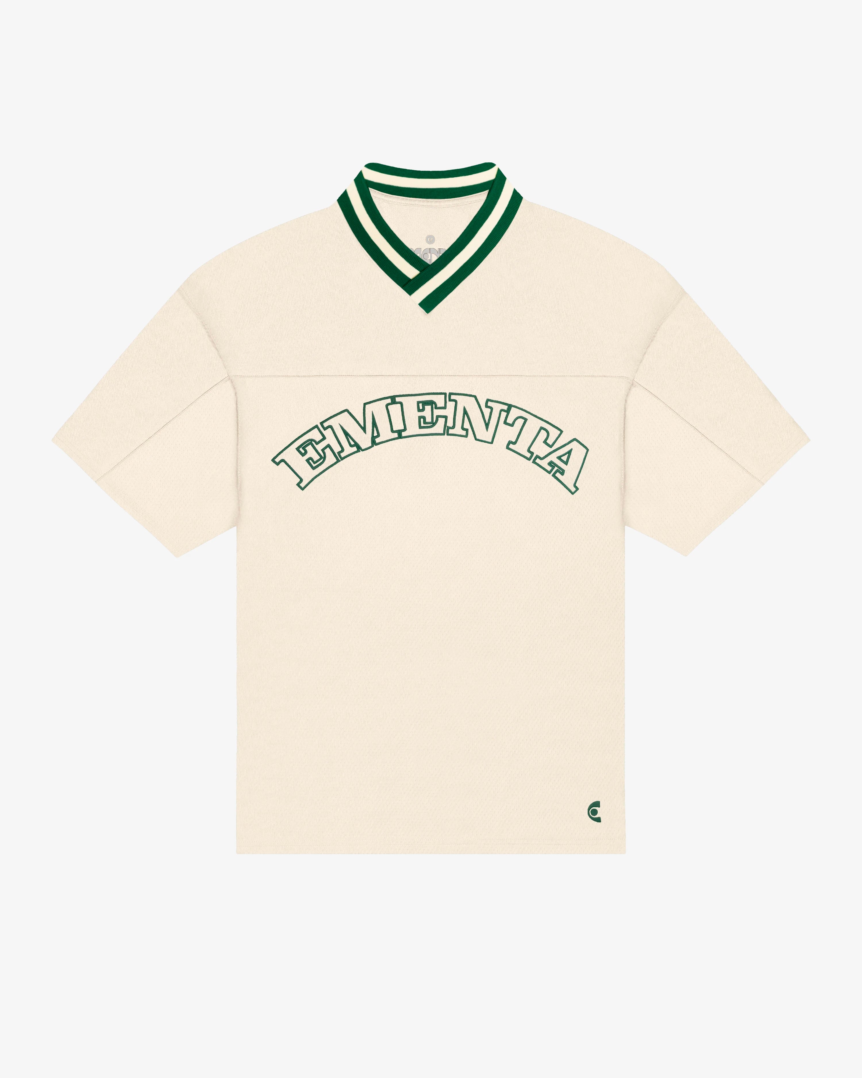 Breathable mesh fabric on the lower half, cotton-poly blend on the upper half
Oversized fit
White color with green accents
Large 'EMENTA' embroidery on the chest, small branded detail embroidered on the bottom right
V-neck collar with double green stripes
Oversized sleeves for a relaxed silhouette
Part of a kit – matching shorts available online
Machine washable